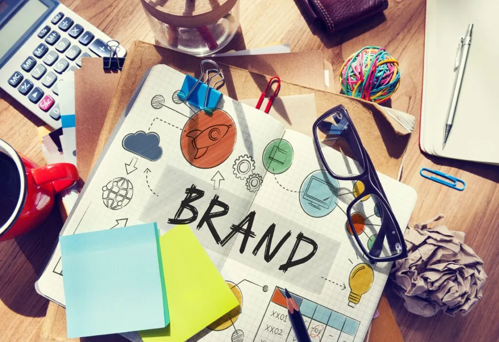 Branding notes with colour swatches, sketches and visual identity ideas